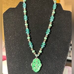 Vintage glass pendant necklace. Handmade with beads.